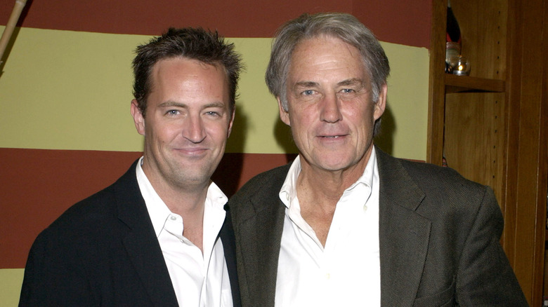 Matthew Perry posiing with dad