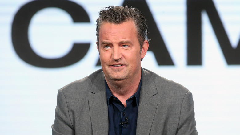 Matthew Perry speaking on stage