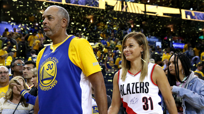 Dell and Sonya Curry at a basketball game together