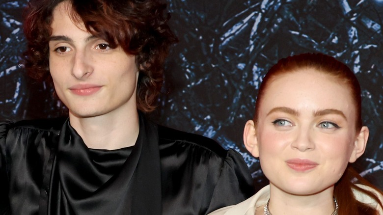 Finn Wolfhard and Sadie Sink smiling