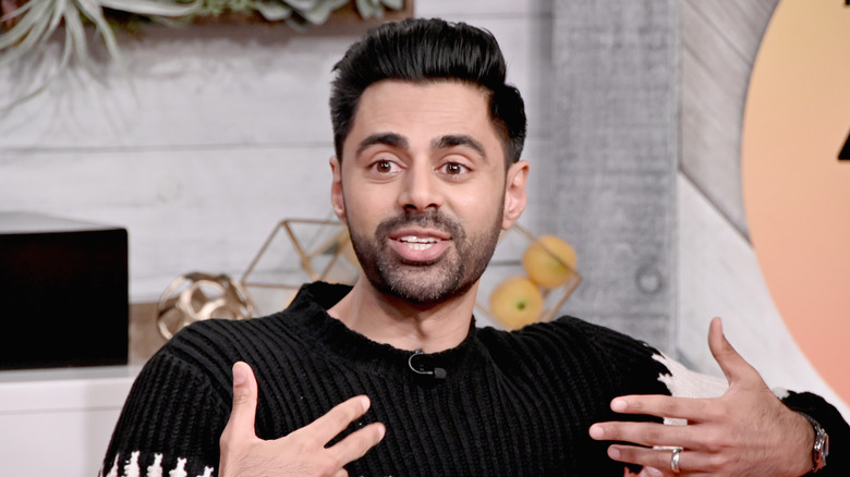 Hasan Minhaj talk show black sweater