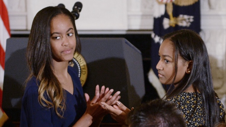 Malia and Sasha Obama looking glum