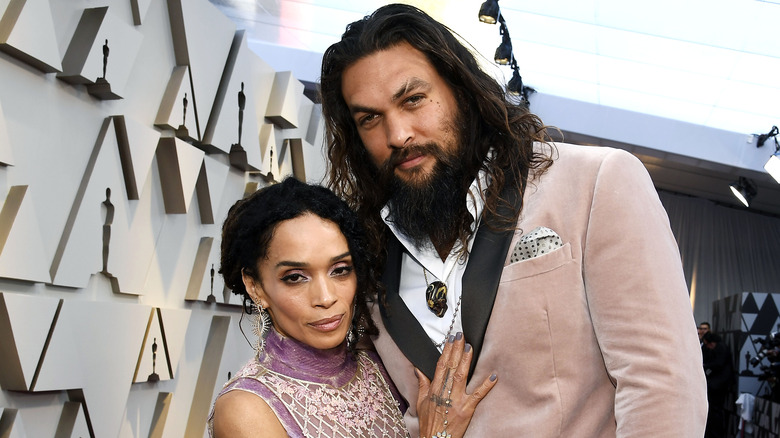 Lisa Bonet and Jason Momoa posing