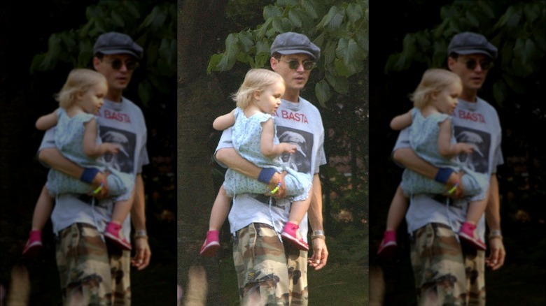 Johnny Depp holding Lily-Rose as a toddler