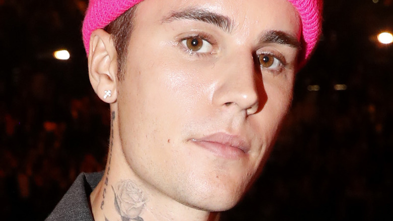 Justin Bieber in pink beanie 