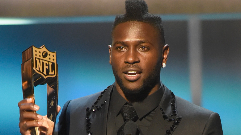 Antonio Brown on stage accepting award