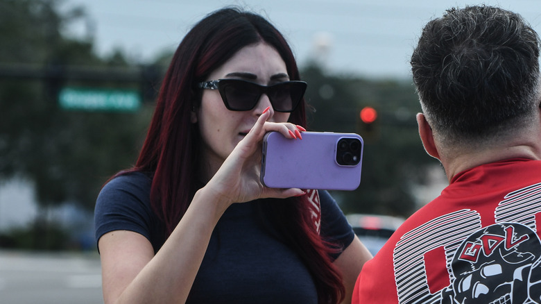 Laura Loomer filming an activist