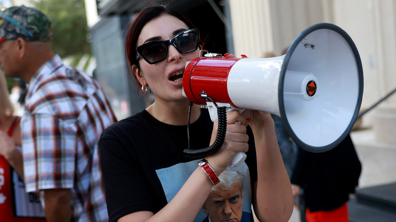 Laura Loomer speaking through megaphone