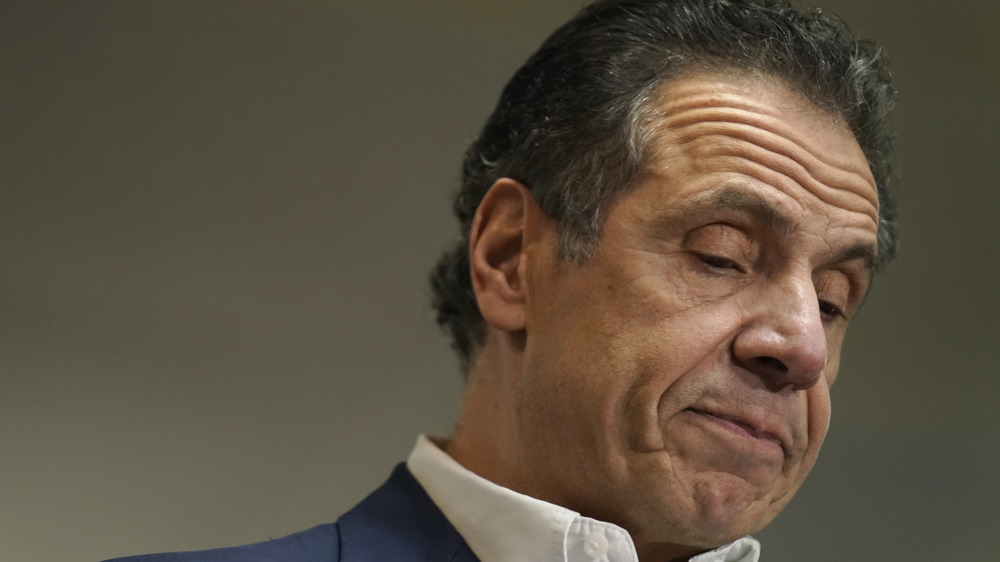 Andrew Cuomo looking downward