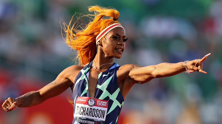 Sha'Carri Richardson celebrates after winning track