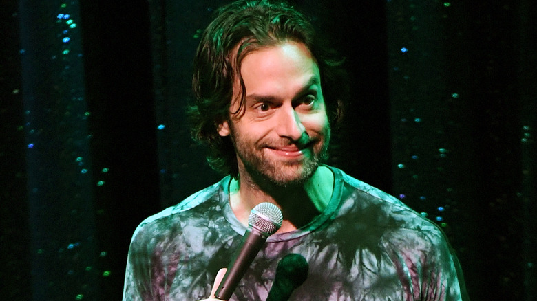 Chris D'Elia sparkly background