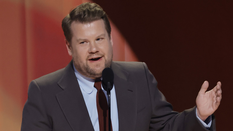 James Corden red tie