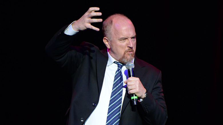 Louis C.K. gesturing onstage