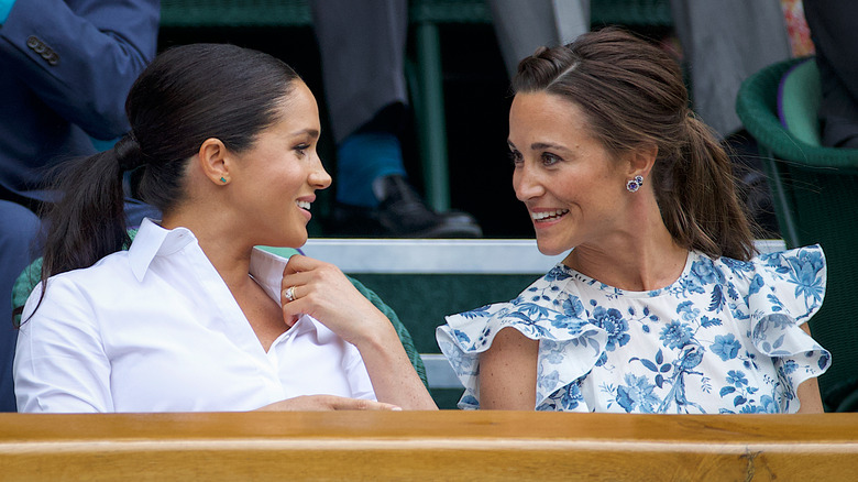 Meghan Markle sitting with Pippa Middleton in the Royal Box on Centre Court ahead of the Ladies Singles Final