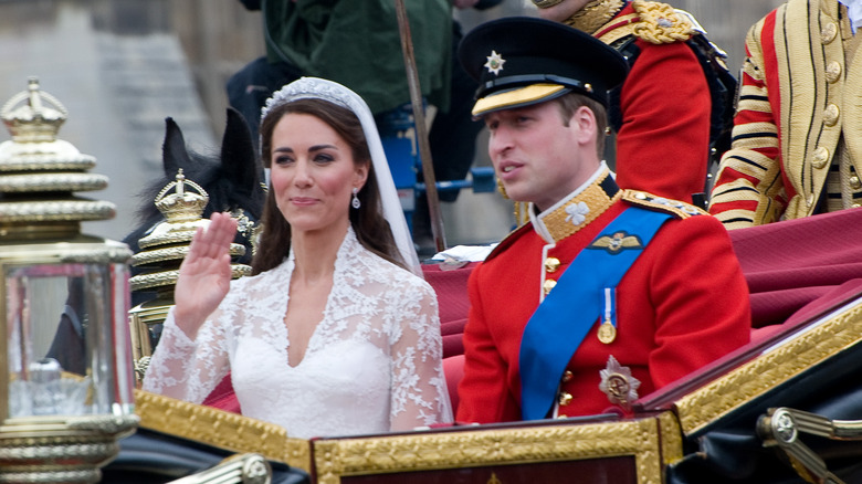 Kate and William in wedding carriage 