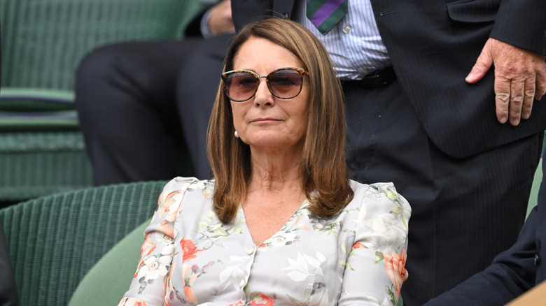 Carole Middleton sits in glasses
