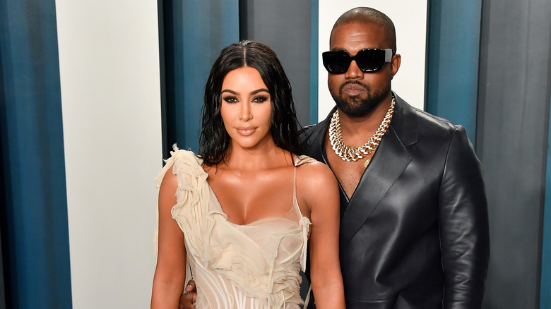 Kanye West poses with Kim Kardashian