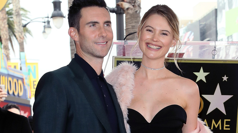 Adam Levine Behati Prinsloo smiling