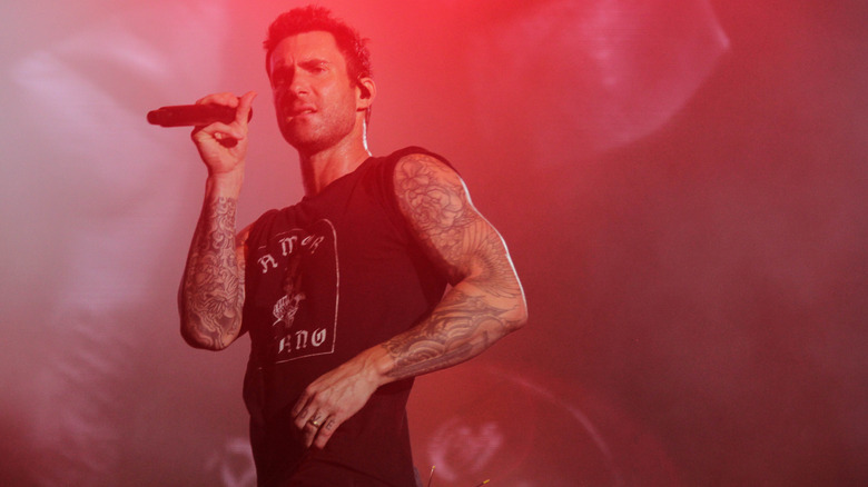 Adam Levine performing