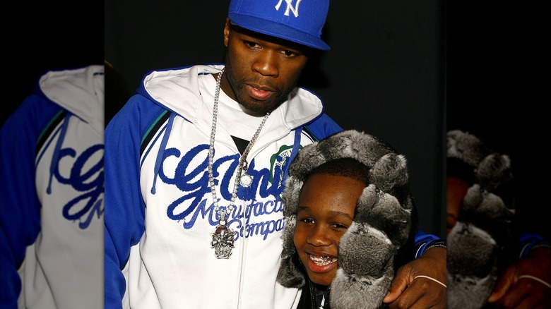 50 Cent and Marquis Jackson posing together