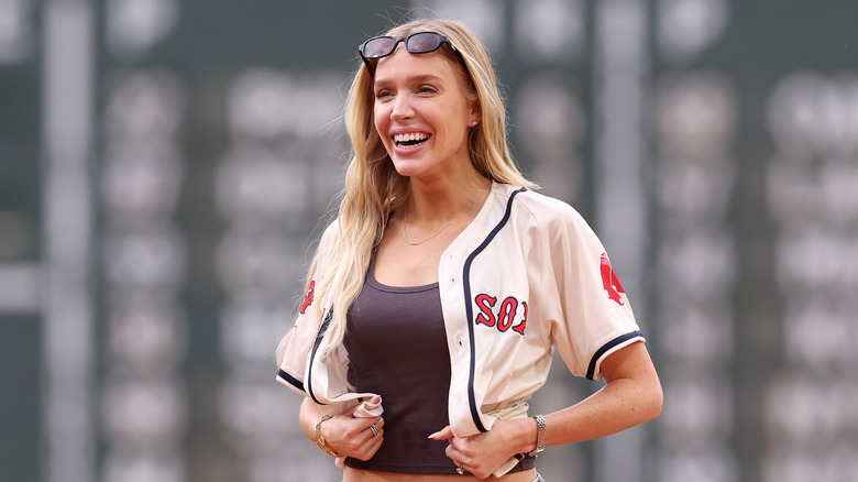 Alex Cooper throws the first pitch at Fenway Park