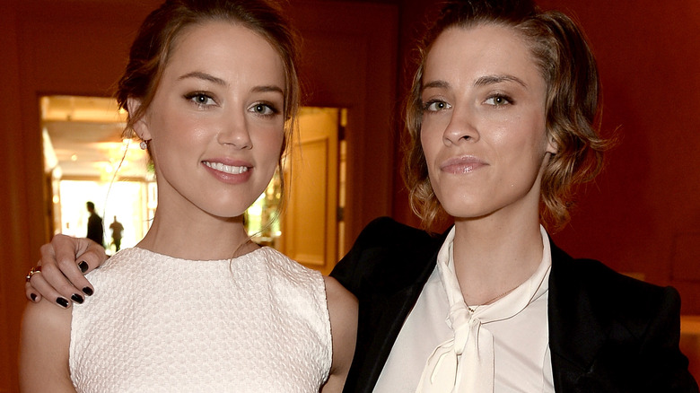 Amber Heard and Whitney Henriquez posing together