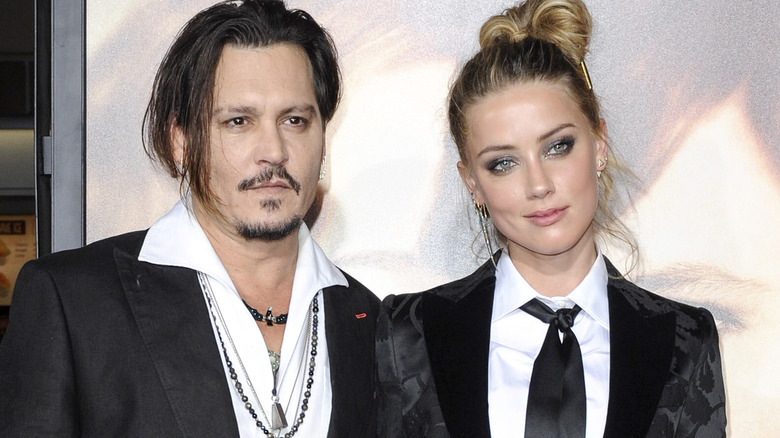 Johnny Depp and Amber Heard posing together