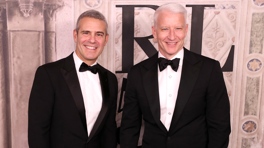 Andy Cohen and Anderson Cooper smiling