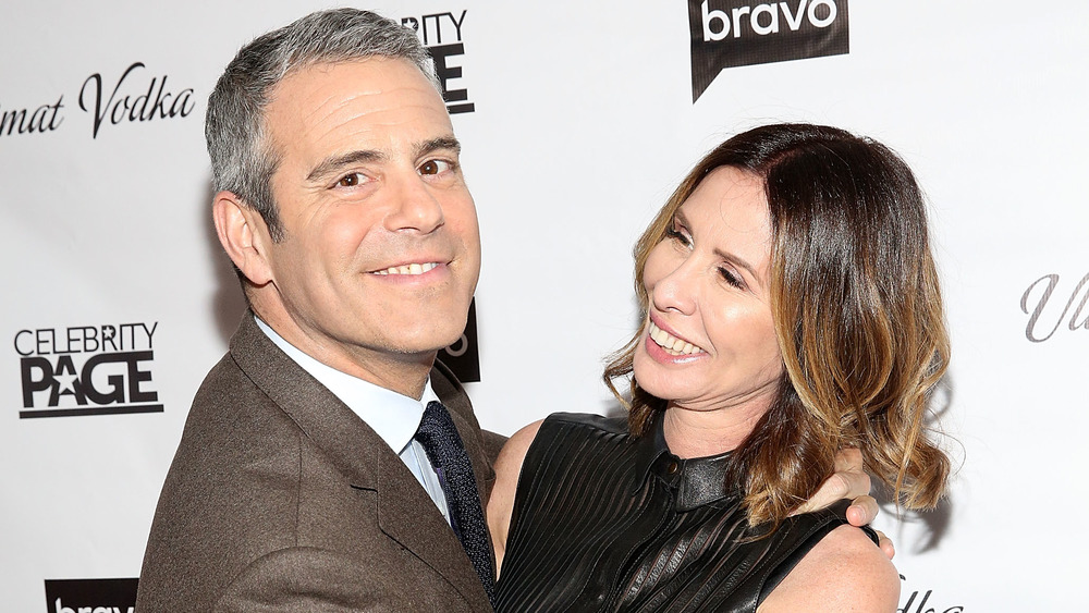 Andy Cohen and Carole Radziwill hugging