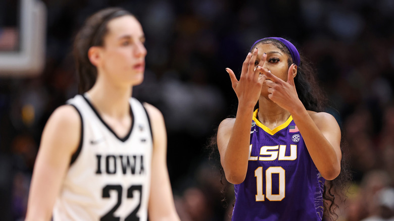 Caitlin Clark and Angel Reese on basketball court