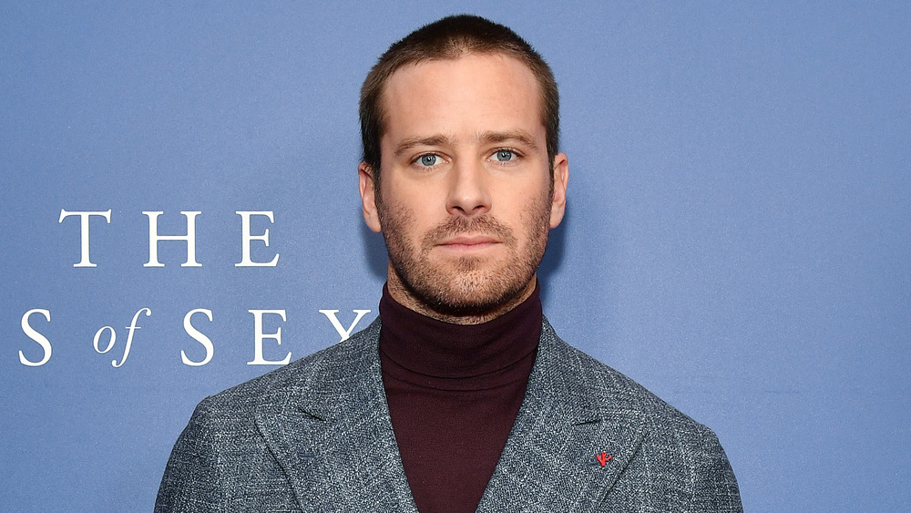 Armie Hammer looks serious at a 2018 On the Basis of Sex screening