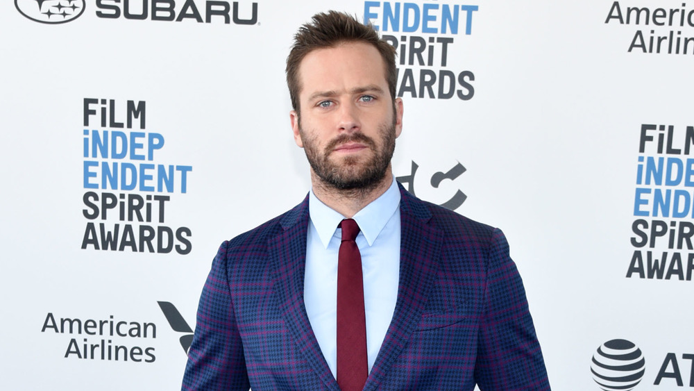 Armie Hammer looks serious at the 2019 Film Independent Spirit Awards