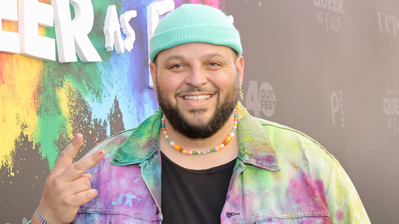 Daniel Franzese wearing rainbow coat