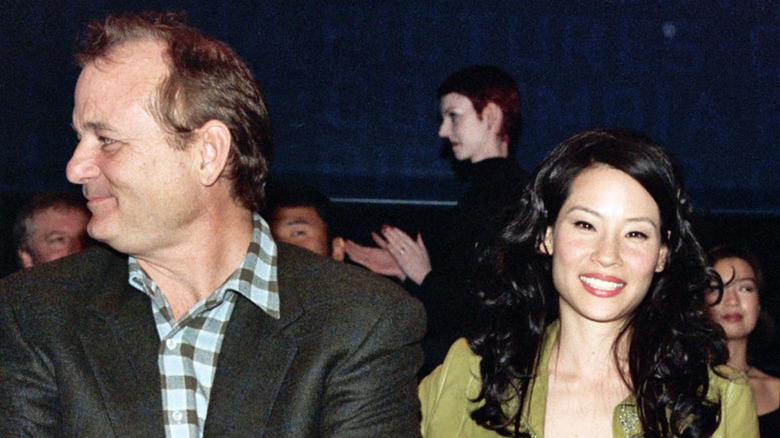 Bill Murray and Lucy Liu smiling at event