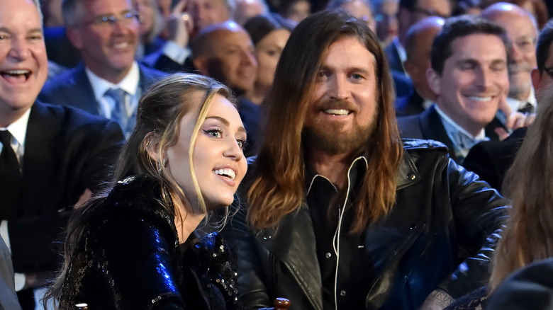 Billy Ray and Miley Cyrus attend an event together