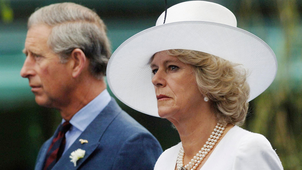 Prince Charles and Camilla Camilla Duchess of Cornwall looking annoyed 