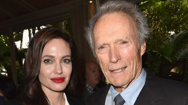 Angelina Jolie and Clint Eastwood smiling together