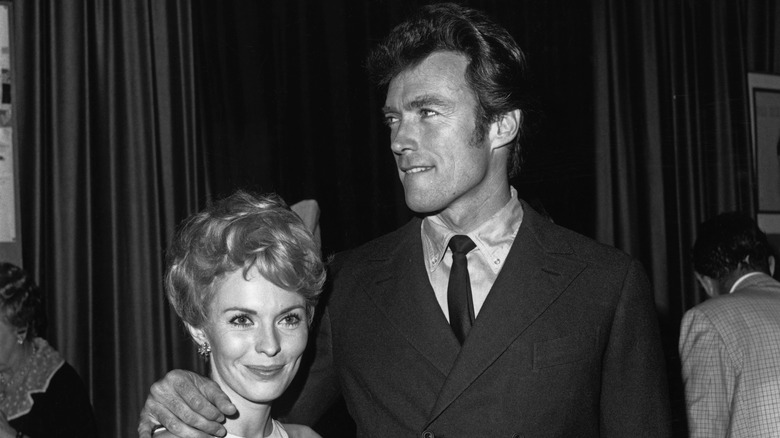 Jean Seberg and Clint Eastwood smiling together at movie premiere