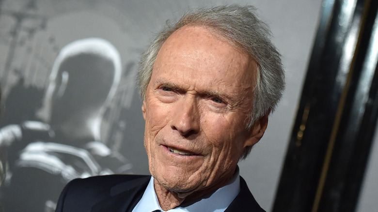 Clint Eastwood smiling at red carpet event