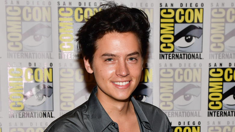 Cole Sprouse smiling at Comic Con