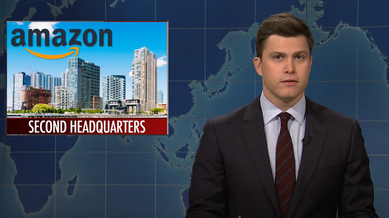 Colin Jost with over-the-shoulder Amazon graphic