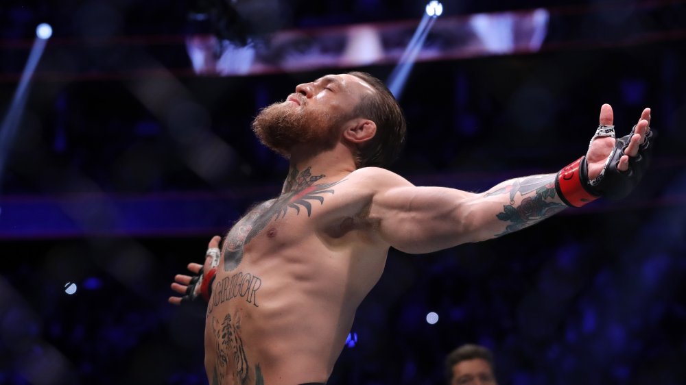 Conor McGregor with arms outstretched 