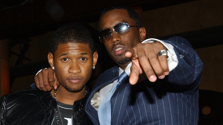 Usher and Sean Combs pose together