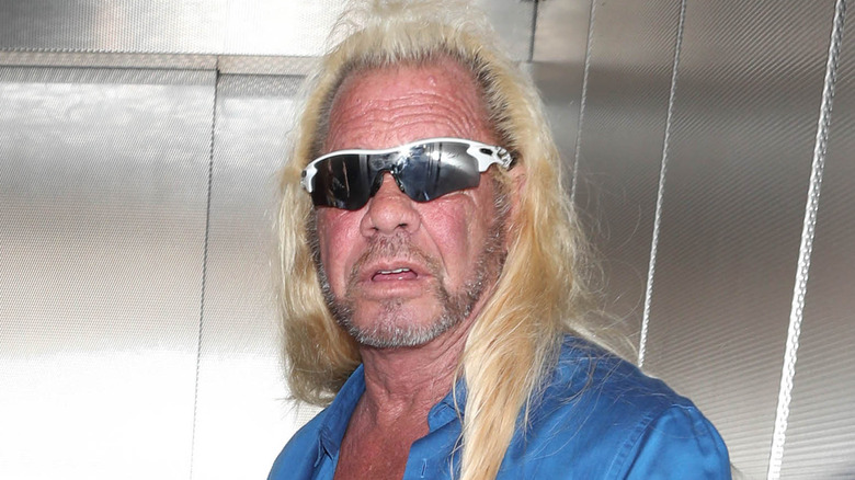 Duane "Dog" Chapman looking back in an elevator