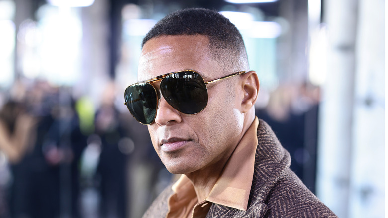 Don Lemon posing in aviators