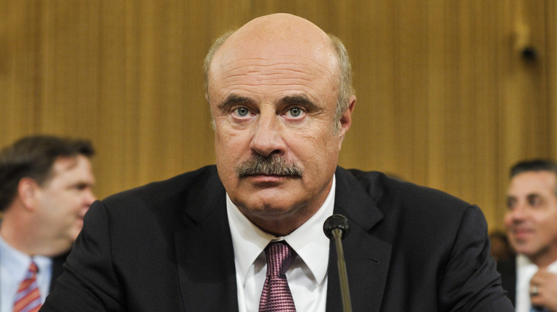 Dr. Phil attends a court hearing