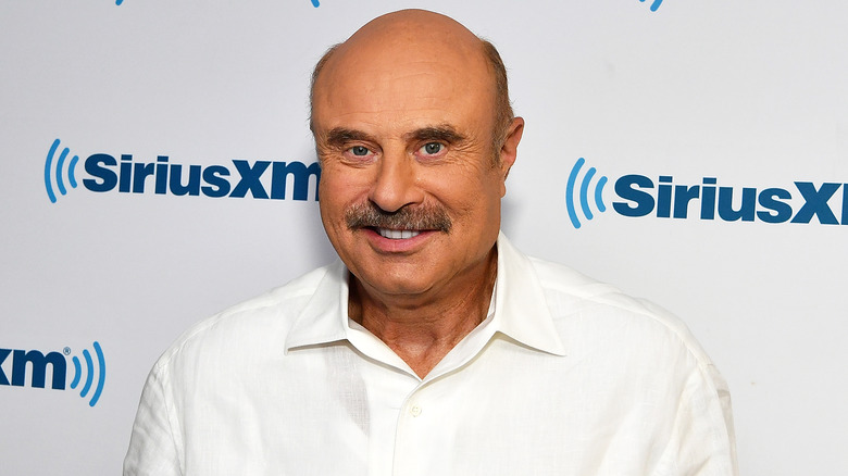 Dr. Phil poses at SiriusXM Radio