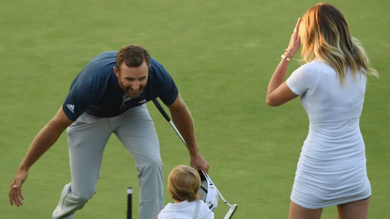 Dustin Johnson greeted by Paulina Gretzky and their son, Tatum, after a match