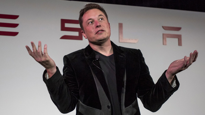 Elon Musk shrugging