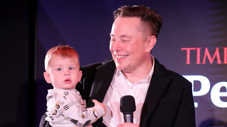 Elon Musk and his son smiling 